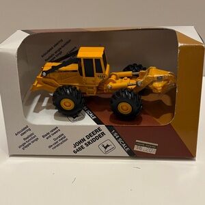 Ertl John Deere Yellow 648E Skidder, 1/64 scale. Vintage 1992, new in box.